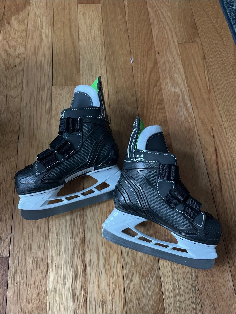 Bauer Kids Ice Skates in Black and Neon Green